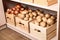 Crates with potatoes and onions. Orderly storage