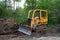 Crawler dozer in forest