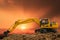 Crawler Excavators are digging the soil in the construction site.