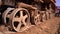 Crawler tracks of a plowing tractor and a field in early spring, a plowed field for crops, close-up,