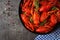 Crayfish. Red boiled crawfishes on table in rustic style, closeup.