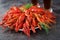 Crayfish. Red boiled crawfishes on table in rustic style, closeup.