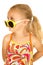 Crazy blond girl wearing sunglasses side view smiling