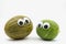 Crazy brown and green melon with googly eyes on white background