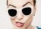 Crazy caucasian glamour woman with stylish sunglasses