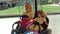 Crazy family drive on bumper cars