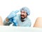 Crazy gynecologist examines a patient. mad doctor expression different emotions and makes different hand\'s signs