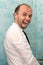 Crazy humorous portrait of business man in shirt in shower