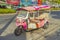 Crazy pink tuk tuk taxi in Don Mueang Bangkok Thailand