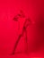 Crazy red man on a red background. figure in a leotard.