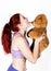 Crazy redhead young woman licks a bears nose