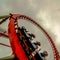 Crazy rollercoaster rides at amusement park