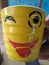 A crazy tea cup giving smile like a alive person.