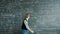 Crazy young man beating chalkboard yelling feeling angry because of science problem