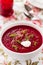 Cream of beetroot soup with cream and fresh herbs