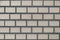 Cream brick wall pattern block background