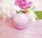 Cream cosmetic petal bloom peony cleanser moisturizing spring aromatherapy flower wooden background