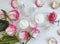 Cream cosmetic rose flower essence handwork , on wooden background