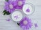 Cream cosmetic wellness flower therapy on background