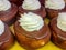 Cream Dollops on Chocolate Doughnuts