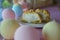Cream puff cakes with custard on pastel background , Choux cream