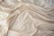 Cream satin fabric texture with soft waves