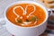Cream soup of carrots for children with bunny close-up
