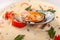 Cream soup with seafood, grilled prawns, mussels in a shell. Mediterranean restaurant menu