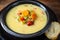Cream soup from vegetables like carrots, red peppers and leek wi