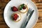 Cream tartlet with juicy and ripe strawberries