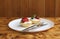 Cream tartlet with juicy and ripe strawberries