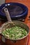 Creamed peas in a pot set on the dining room table