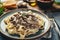 Creamy beef stroganoff with fresh greenery. Generative AI