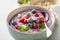 Creamy cold soup with frozen berries and mint