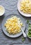 Creamy corn pasta. Linguine with creamy corn on a gray background