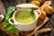 Creamy leek soup on wooden background