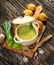 Creamy leek soup on wooden background