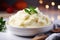 Creamy mashed potatoes in white bowl in white kitchen. Healthy food. Generative AI