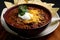 Creamy and Mild Chili Con Carne with a Dollop of Sour Cream and Cheddar Cheese