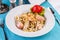 Creamy pasta with shrimps, crab meat, seafood, squid rings, tomatoes, basil, greens and cheese.