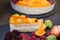 Creamy peach and apple cake topped with fruit gelatin, slice of creamy fruit cake topped with fruit jelly