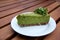Creamy raw vegan kale pie served on plate