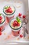 Creamy red jelly with raspberries, cream and almonds