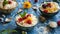 Creamy rice pudding with raspberry and orange slices in ceramic bowls. Gourmet dessert