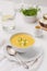 Creamy squash soup in a white bowl