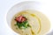 Creamy white asparagus and potato soup with bacon