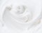Creamy yoghurt swirled round close-up