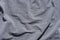 Creased gray textile background texture
