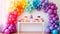 Create a rainbow-themed birthday party with a vibrant cake