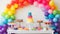 Create a rainbow-themed birthday party with a vibrant cake